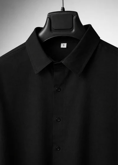 Black Oversized Shirt - Collar detail on hanger