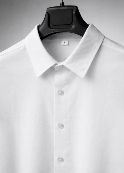 White Oversized Shirt - Collar detail on hanger